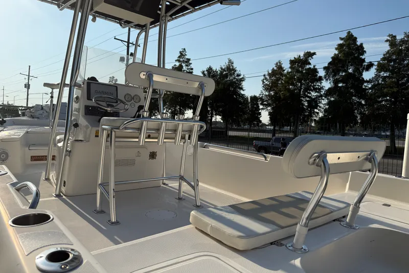 Slide: The Image of 2020 Bulls Bay 2400 XS boat interior with seating and control panel. - 10