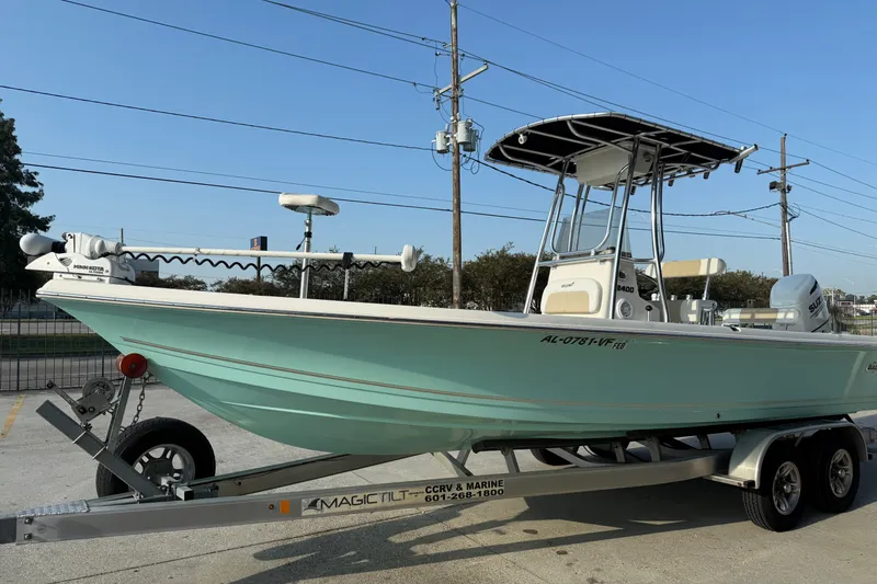Slide: The Image of 2020 Bulls Bay 2400 XS boat on trailer, featuring a sleek design and modern equipment. - 6