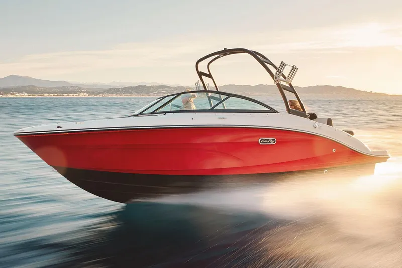 The Image of Manufacturer Provided Image: 2025 Sea Ray SPX 210 boat cruising on open water at sunset. - 0