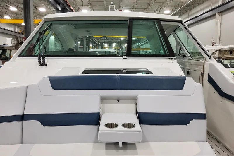 Slide: The Image of 2027 Formula 400 Super Sport Crossover boat interior with seating and cup holders. - 18