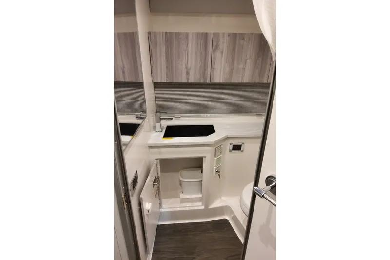 Slide: The Image of Interior of 2027 Formula 400 Super Sport Crossover boat bathroom with modern fixtures. - 34