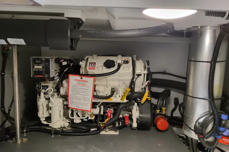 Slide: The Image of Engine compartment of 2027 Formula 400 Super Sport Crossover boat, showcasing mechanical components. - 51