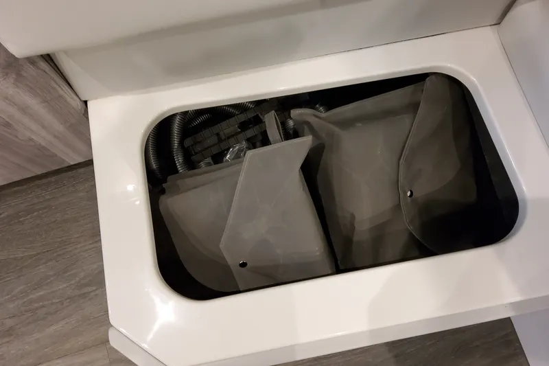 Slide: The Image of Storage compartment in 2027 Formula 400 Super Sport Crossover boat, featuring organized equipment. - 31