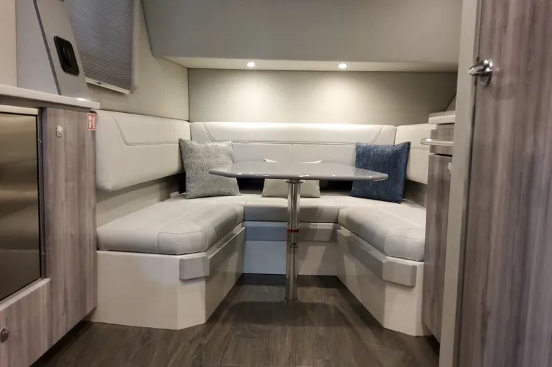 Slide: The Image of Interior of 2027 Formula 400 Super Sport Crossover with modern seating and table. - 32