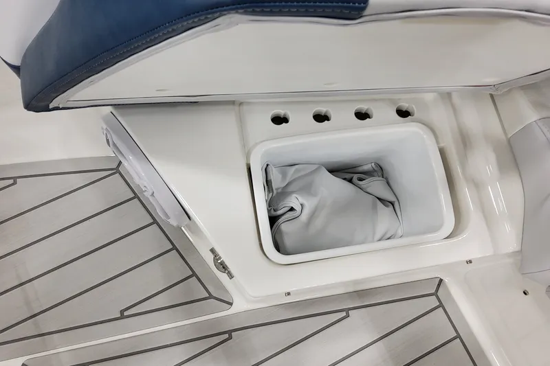 Slide: The Image of 2027 Formula 400 Super Sport Crossover boat storage compartment with cushioned seating. - 10