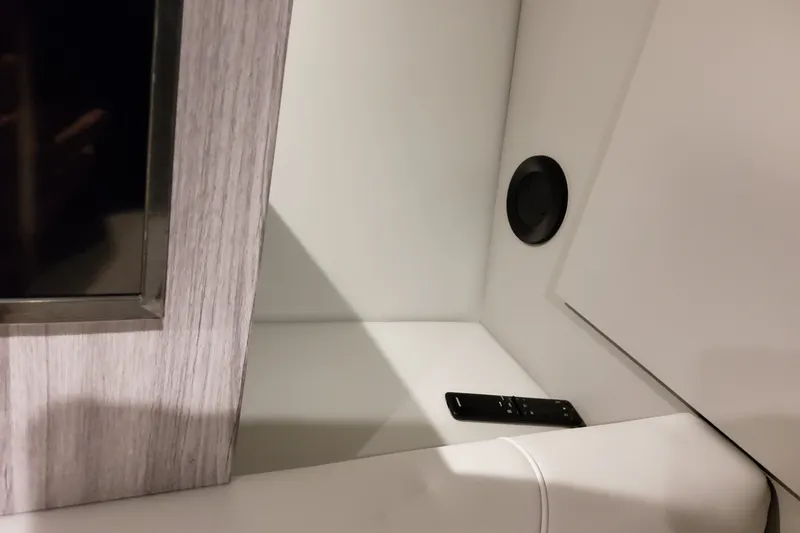 Slide: The Image of Interior of 2027 Formula 400 Super Sport Crossover with remote control on white surface. - 38