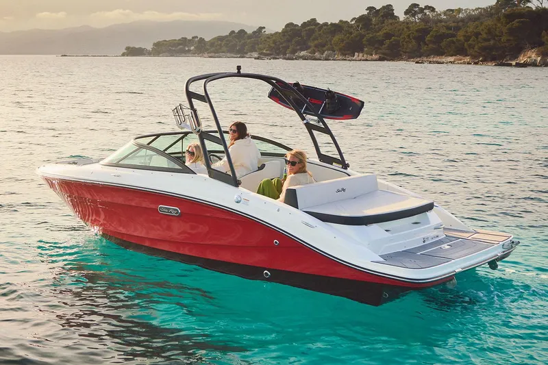 Slide: The Image of Manufacturer Provided Image: 2025 Sea Ray SPX 210 boat cruising on clear water with passengers. - 1