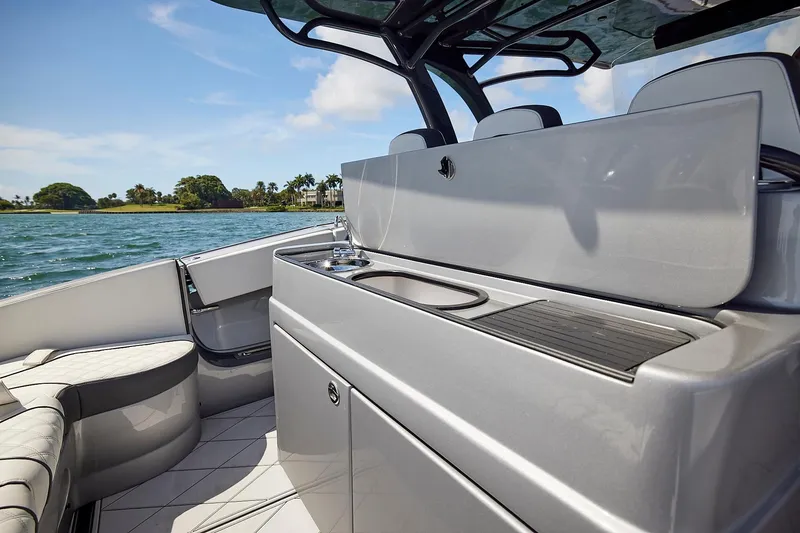 Slide: The Image of 2022 Midnight Express 43 Open boat interior with sleek design and modern amenities. - 22