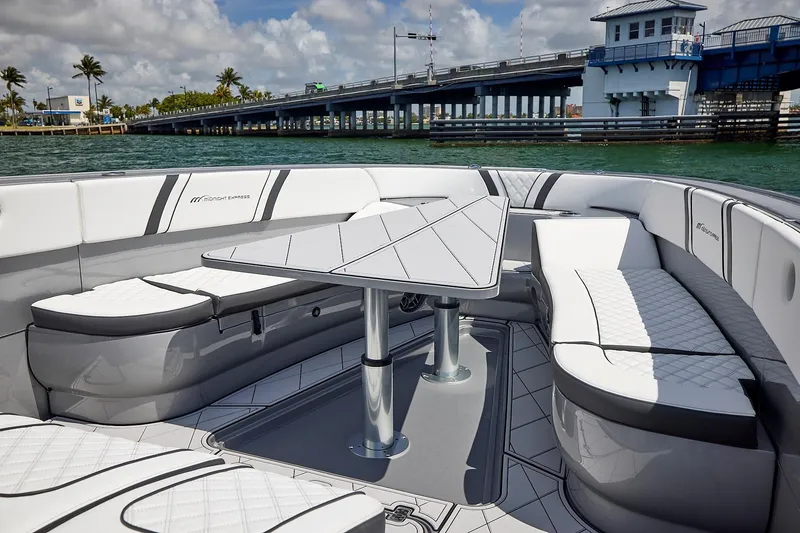 Slide: The Image of Luxurious 2022 Midnight Express 43 Open boat interior with elegant seating and table. - 39