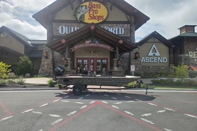 The Image of 2027 Tracker Grizzly 1860 CC boat outside Bass Pro Shops store. - 0