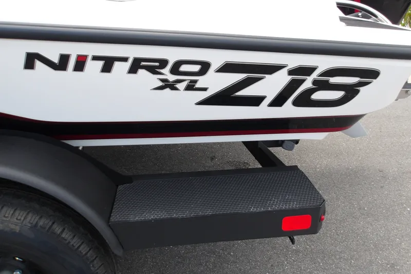 Slide: The Image of 2027 Nitro Z18 XL Pro boat logo on white hull with black step. - 19