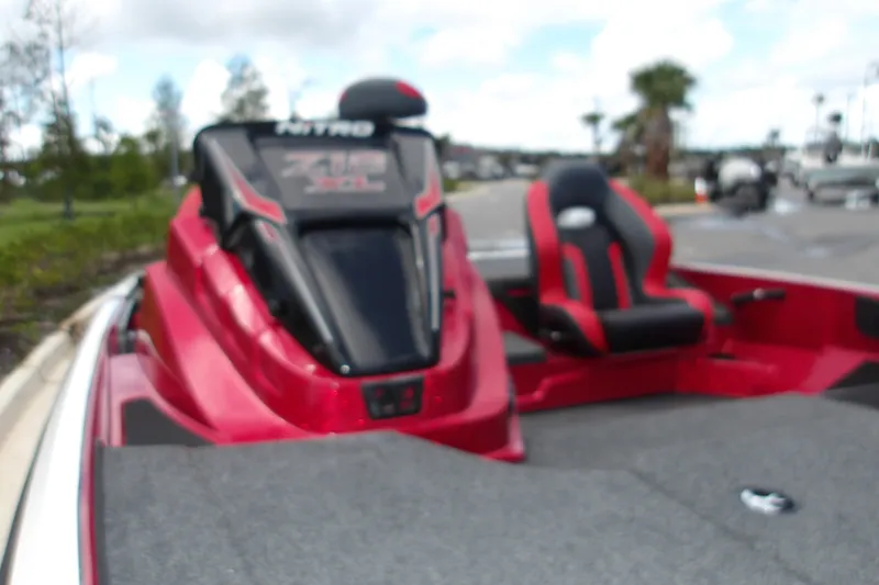 Slide: The Image of Red Nitro Z18 XL Pro 2027 boat with sleek design and comfortable seating. - 11