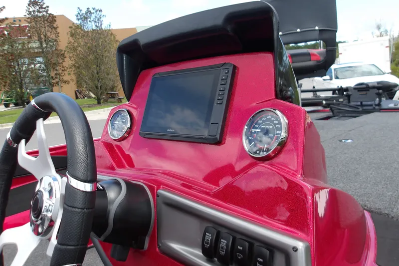 Slide: The Image of Dashboard of 2027 Nitro Z18 XL Pro boat with steering wheel and gauges. - 9