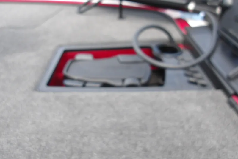 Slide: The Image of Blurred interior view of a 2027 Nitro Z18 XL Pro boat compartment. - 12