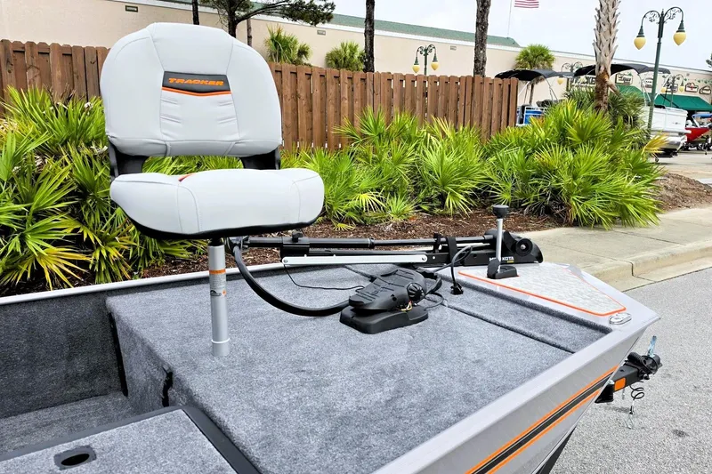 Slide: The Image of 2027 Tracker Bass Tracker Classic Limited boat with fishing seat and trolling motor. - 17
