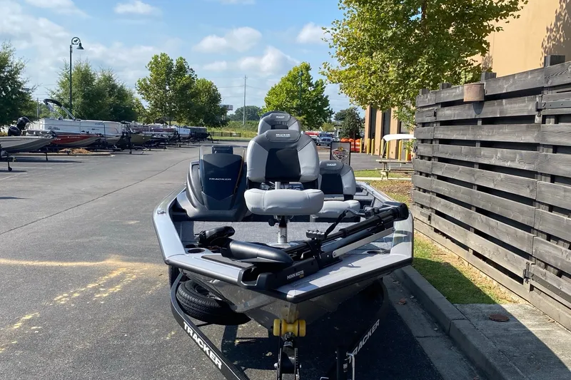 Slide: The Image of 2027 Tracker Pro Team 175 Crappie Edition boat parked outdoors on a sunny day. - 24