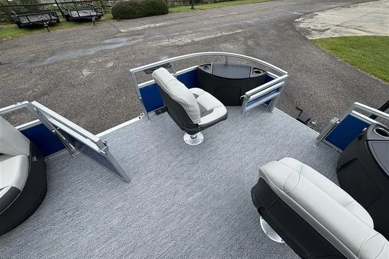 Slide: The Image of 2027 Sun Tracker Bass Buggy 18 DLX pontoon boat interior with seating and open deck. - 13