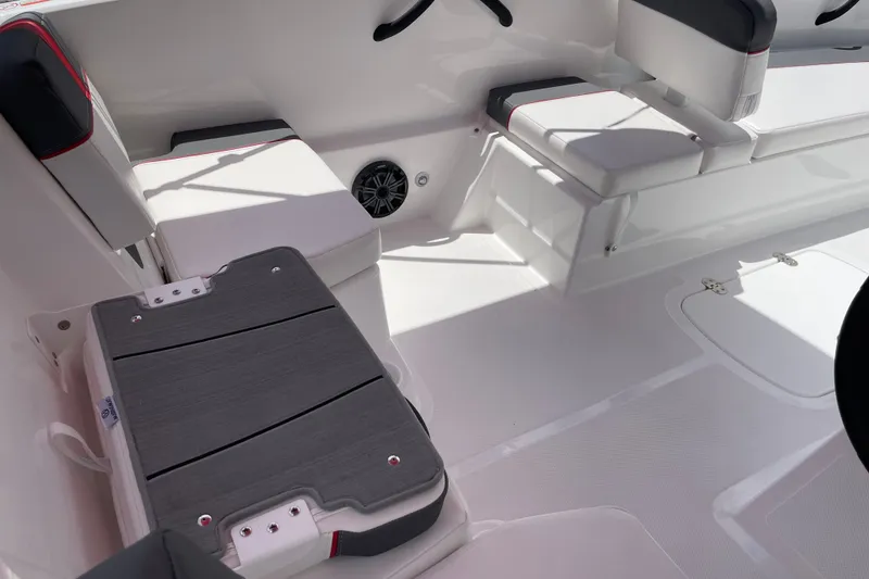 Slide: The Image of Interior of 2027 Tahoe T18 boat with cushioned seating and speaker system. - 6