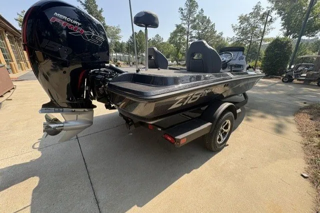 Slide: The Image of 2027 Nitro Z18 XL Pro boat with Mercury Pro XS engine, parked outdoors. - 1