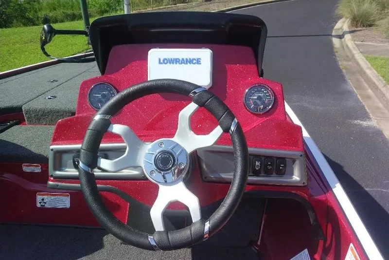 Slide: The Image of Steering console of a 2027 Nitro Z18 XL boat with Lowrance display. - 7