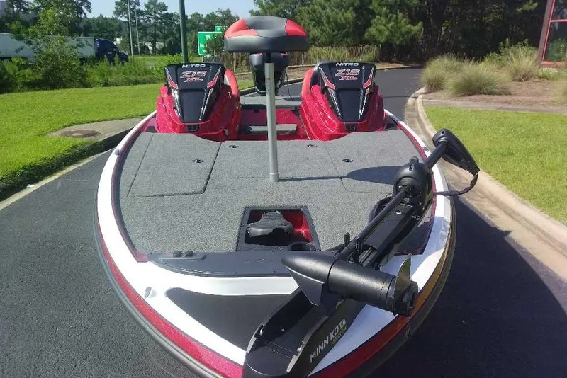 Slide: The Image of 2027 Nitro Z18 XL boat with dual seats and Minn Kota trolling motor. - 1