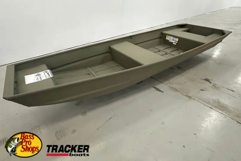 The Image of 2027 Tracker Grizzly 14 Jon boat displayed in showroom with Bass Pro Shops logo. - 0