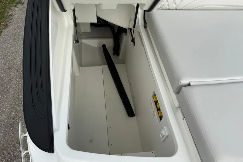 Slide: The Image of Storage compartment of 2027 Sea Ray SLX 260 boat, featuring sleek design and ample space. - 23