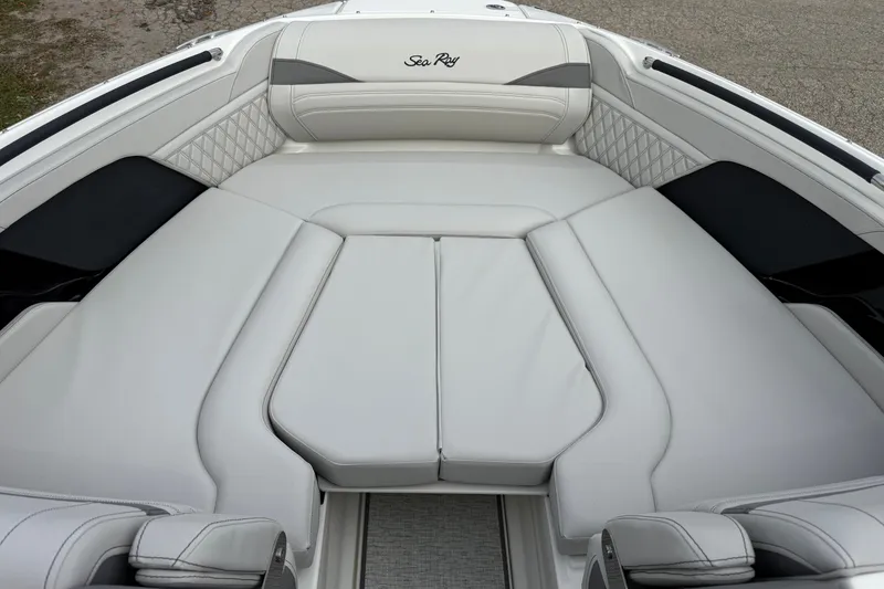 Slide: The Image of Luxurious seating area of 2027 Sea Ray SLX 260 boat with elegant upholstery. - 16