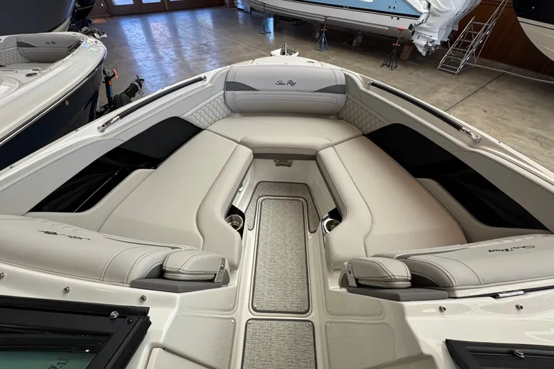 Slide: The Image of Luxurious interior of 2027 Sea Ray SLX 280 boat with plush seating. - 18
