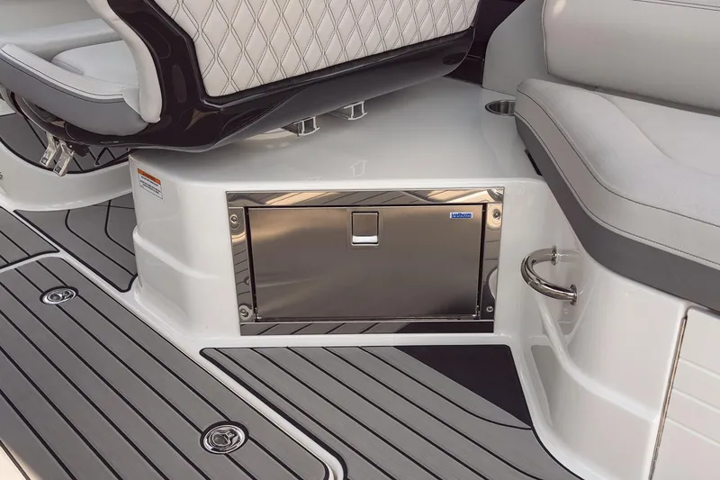 Slide: The Image of Manufacturer Provided Image: 2025 Sea Ray SLX 280 boat interior with sleek seating and storage compartment. - 6
