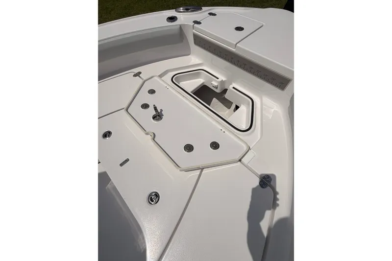 Slide: The Image of 2027 Blackfin 242 HB boat deck with storage compartments and measurement guide. - 25