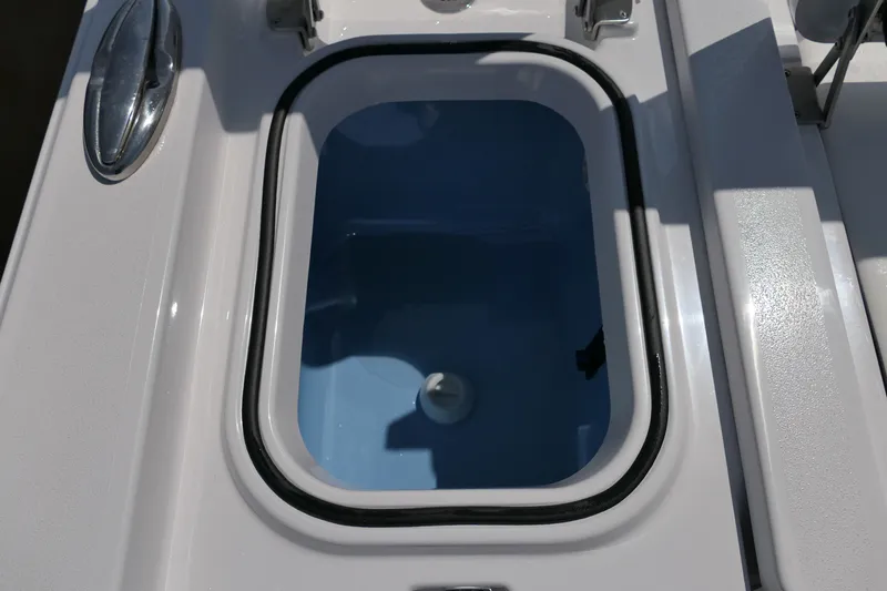 Slide: The Image of Livewell compartment on a 2027 Blackfin 242 HB boat, featuring a sleek design. - 40