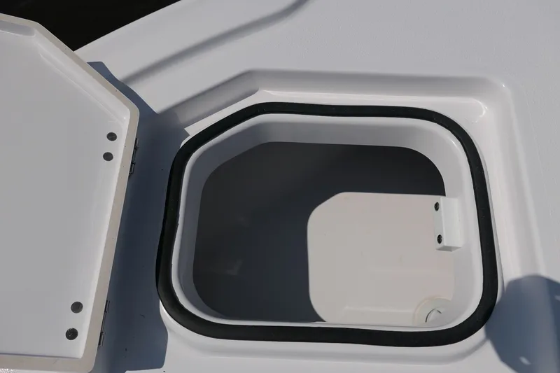Slide: The Image of Open storage compartment on 2027 Blackfin 242 HB boat deck. - 42