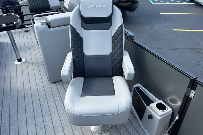 Slide: The Image of Captain's chair on 2026 Sylvan L3 LZ Tritoon boat, featuring sleek design and comfortable seating. - 10