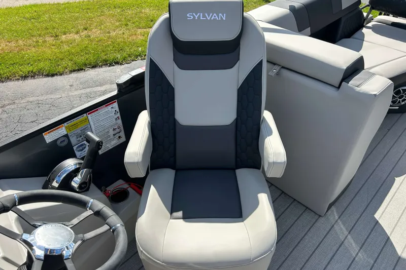 Slide: The Image of Captain's chair on 2026 Sylvan L3 LZ Tritoon boat, featuring sleek design and comfortable seating. - 12