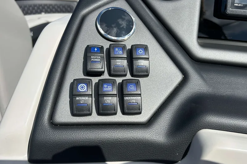 Slide: The Image of Control panel of 2026 Sylvan L3 LZ Tritoon with various light switches. - 15