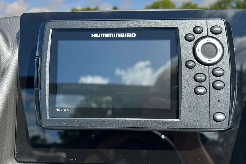 Slide: The Image of Humminbird Helix 5 fish finder on 2026 Sylvan L3 LZ Tritoon dashboard. - 17