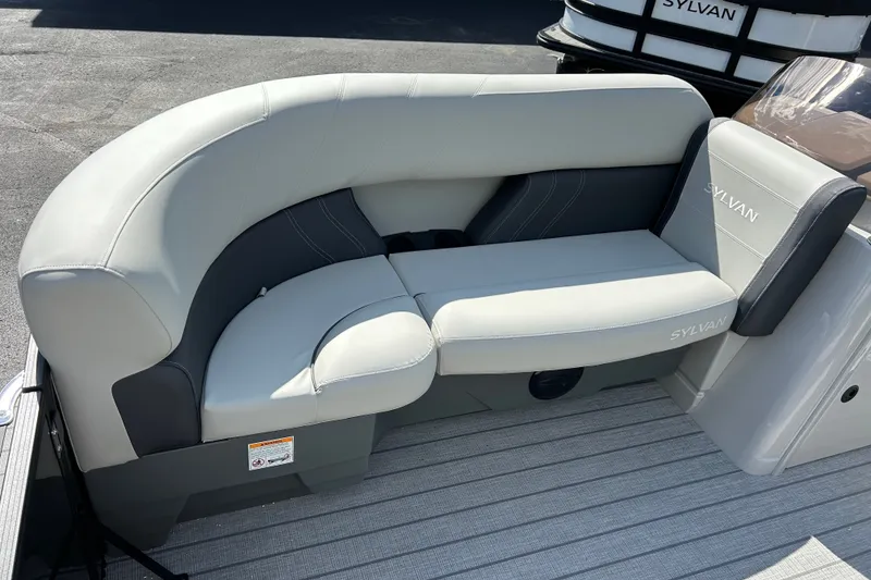 Slide: The Image of Luxurious seating on the 2026 Sylvan Mirage 820 Cruise pontoon boat, featuring elegant upholstery. - 12
