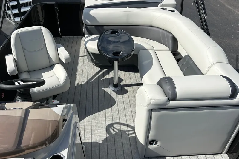 Slide: The Image of Luxurious seating on 2026 Sylvan Mirage 820 Cruise pontoon boat with sleek design. - 9
