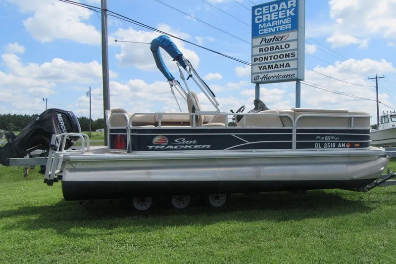 The Image of 2019 SUNTRACKER 20 DLX PARTY BARGE pontoon boat displayed at Cedar Creek Marine Center. - 1