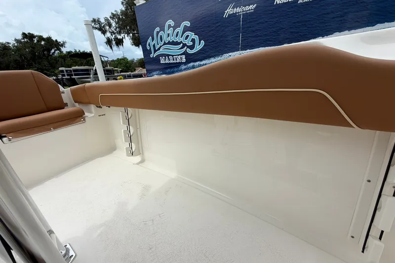 Slide: The Image of Interior view of 2025 Key West 219 FS boat with tan seating. - 27