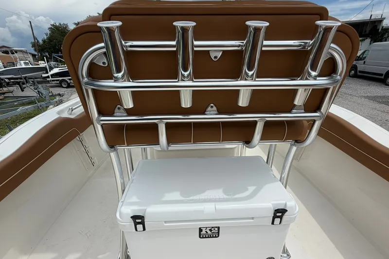 Slide: The Image of 2025 Key West 219 FS boat interior with rod holders and cooler. - 23