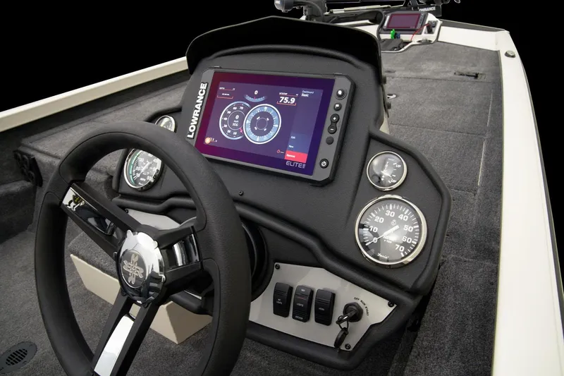 Slide: The Image of 2023 Ranger RT198P boat dashboard with Lowrance Elite display and gauges. - 6