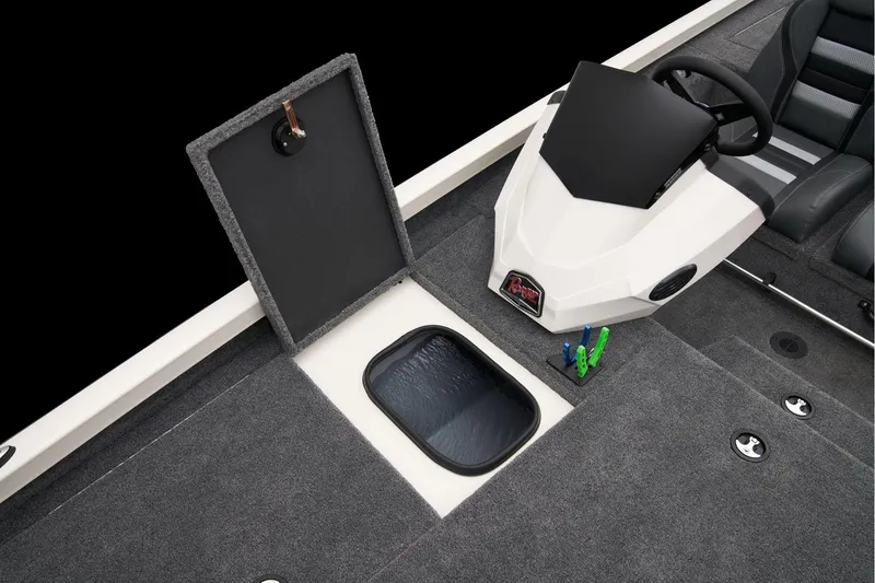 Slide: The Image of 2023 Ranger RT198P boat interior with storage compartment and steering console. - 8