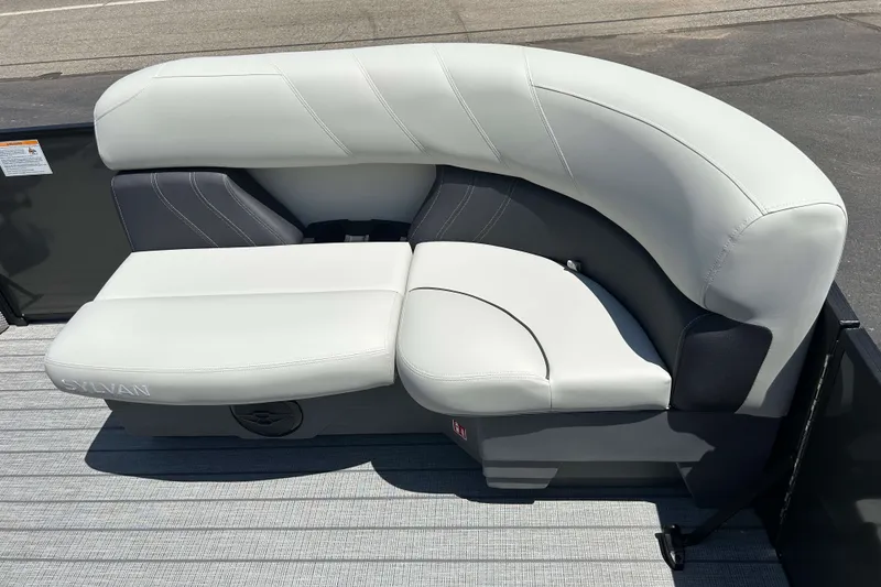 Slide: The Image of Luxurious seating on 2026 Sylvan Mirage 820 LZ pontoon boat, featuring sleek white upholstery. - 12