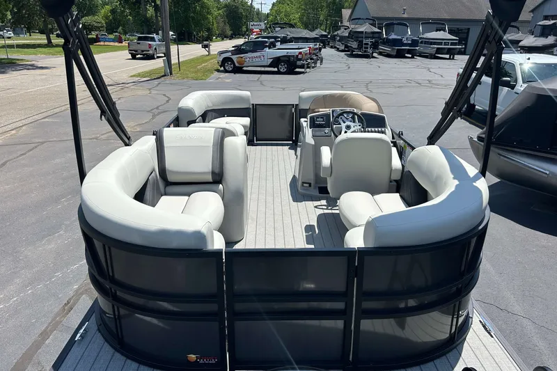 Slide: The Image of 2026 Sylvan Mirage 820 LZ pontoon boat with spacious seating and modern design. - 2