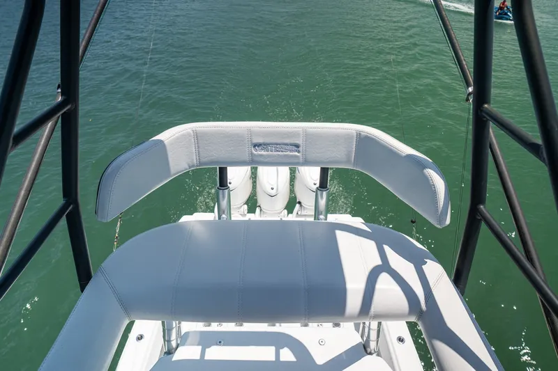 Slide: The Image of 2025 Contender 39 ST boat helm seat with ocean view. - 21