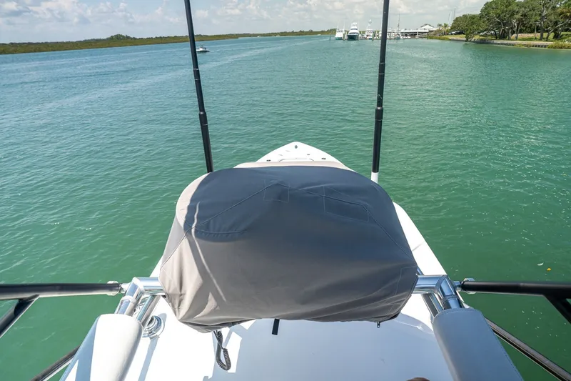 Slide: The Image of Bow view of 2025 Contender 39 ST boat on calm water. - 20