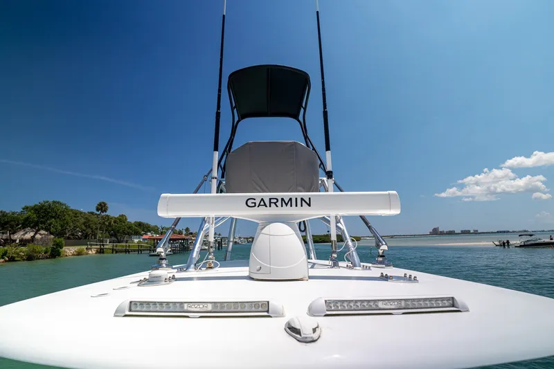 Slide: The Image of 2025 Contender 39 ST boat with Garmin equipment on a sunny day. - 10