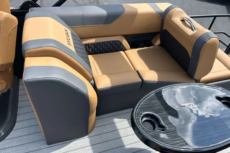 Slide: The Image of Luxurious seating on 2027 Sylvan X3 LZ DH Tritoon with sleek table design. - 4